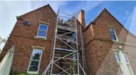 side inaction scaffold tower brick building